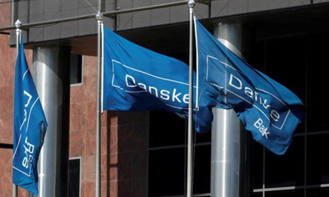 Danske Bank får forhøjet kapitalkrav og stopper tilbagekøb af egne aktier; bekræfter dialog med ameriakanske myndigheder